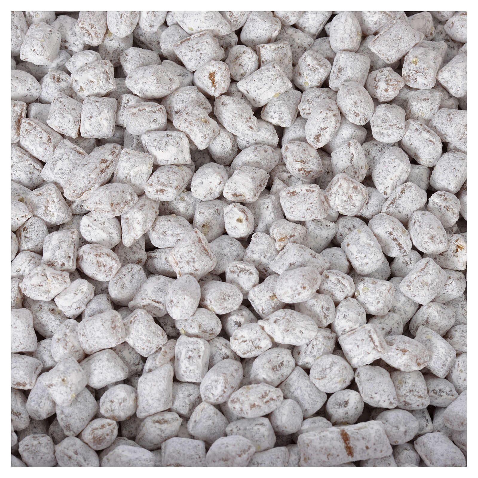 Ein Haufen weißer Kieselsteine auf einem Hintergrund, durchzogen mit Griechischer Weihrauch-Myrrhe.