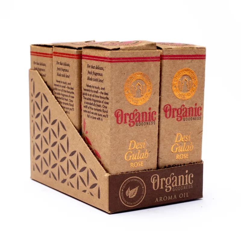 Vier Schachteln Bio-Kaffee in einem Karton.